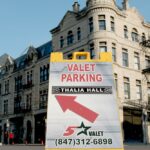 A valet parking sign from Five Star Valet points to the location of a stand near Thalia Hall.